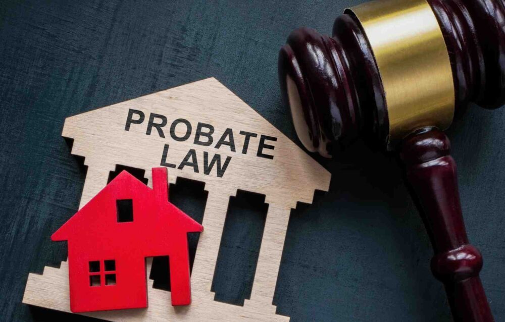 What Is Probate? A small house shaped wooden plaque that says probate law on it.