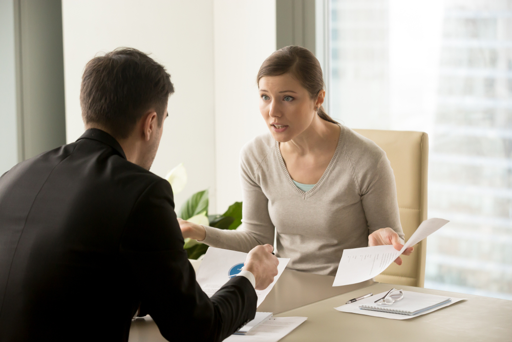 Woman having a discussion with a solicitor.